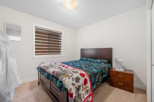 235 Saddlestone Grove Ne, Calgary, AB - Indoor Photo Showing Bedroom