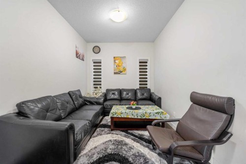 235 Saddlestone Grove Ne, Calgary, AB - Indoor Photo Showing Living Room
