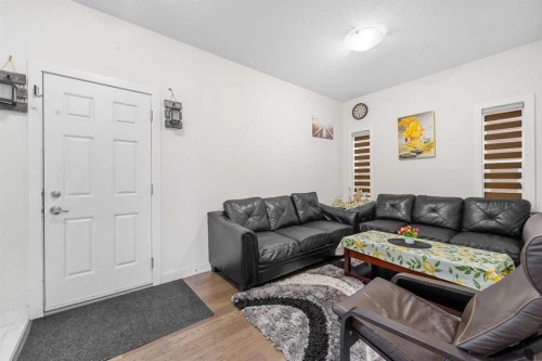 235 Saddlestone Grove Ne, Calgary, AB - Indoor Photo Showing Living Room