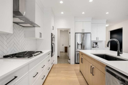 271 West Grove Point Sw, Calgary, AB - Indoor Photo Showing Kitchen With Upgraded Kitchen