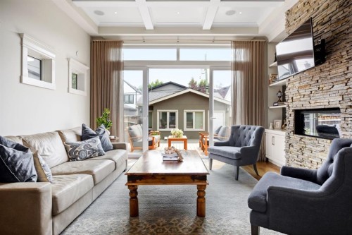 2037 48 Avenue Sw, Calgary, AB - Indoor Photo Showing Living Room With Fireplace