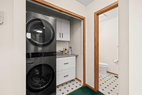 9473 Hidden Valley Drive Nw, Calgary, AB - Indoor Photo Showing Laundry Room