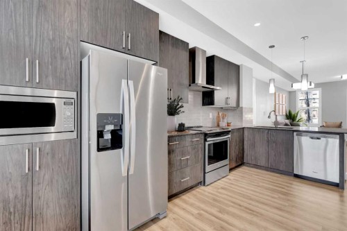 4135 Seton Drive Se, Calgary, AB - Indoor Photo Showing Kitchen With Stainless Steel Kitchen With Upgraded Kitchen