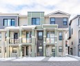 4135 Seton Drive Se, Calgary, AB  - Outdoor With Balcony With Facade 