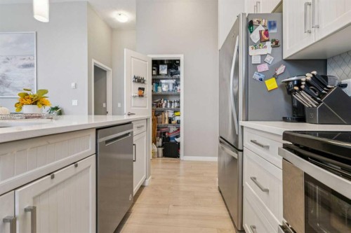 115-10 Mahogany Mews Se, Calgary, AB - Indoor Photo Showing Kitchen With Stainless Steel Kitchen
