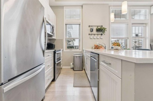 115-10 Mahogany Mews Se, Calgary, AB - Indoor Photo Showing Kitchen With Stainless Steel Kitchen