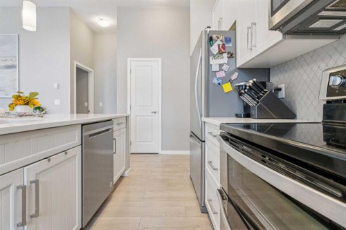 115-10 Mahogany Mews Se, Calgary, AB - Indoor Photo Showing Kitchen With Upgraded Kitchen