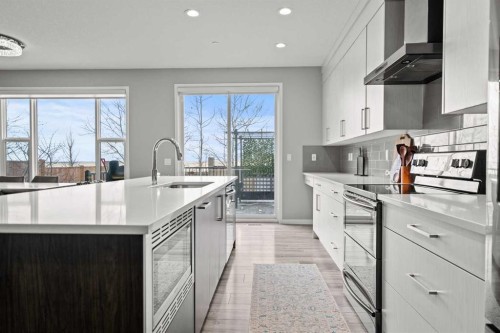 66 Howse Common Ne, Calgary, AB - Indoor Photo Showing Kitchen With Upgraded Kitchen