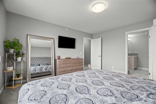 66 Howse Common Ne, Calgary, AB - Indoor Photo Showing Bedroom