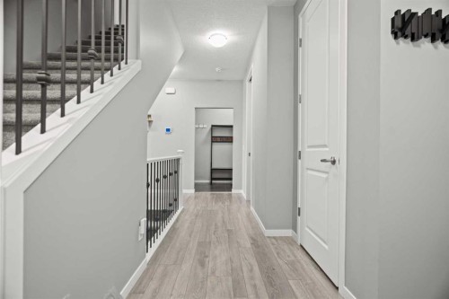 66 Howse Common Ne, Calgary, AB - Indoor Photo Showing Other Room