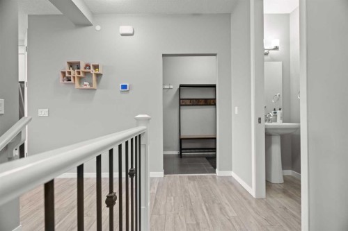 66 Howse Common Ne, Calgary, AB - Indoor Photo Showing Other Room