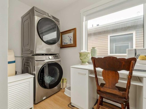 318 Whispering Way, Vulcan, AB - Indoor Photo Showing Laundry Room