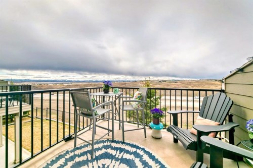 637-101 Sunset Drive, Cochrane, AB - Outdoor With Balcony With View With Exterior