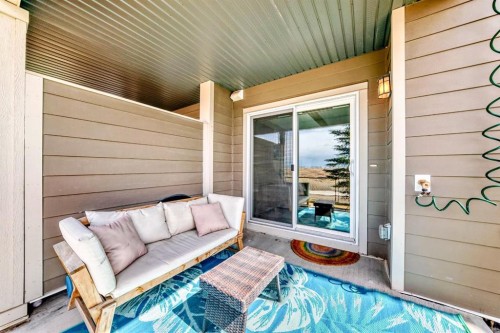 637-101 Sunset Drive, Cochrane, AB - Outdoor With Deck Patio Veranda With Exterior