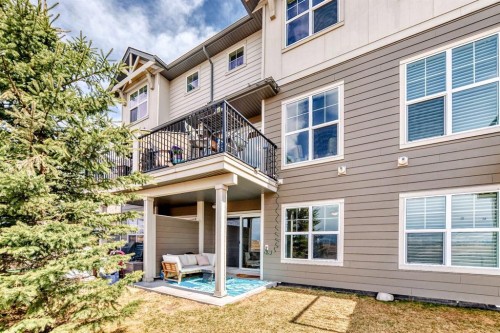 637-101 Sunset Drive, Cochrane, AB - Outdoor With Balcony With Deck Patio Veranda With Exterior