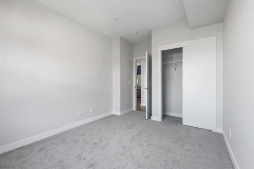 303-255 Les Jardins Park Se, Calgary, AB - Indoor Photo Showing Other Room