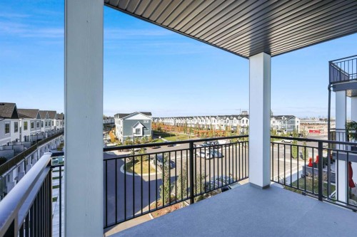 303-255 Les Jardins Park Se, Calgary, AB - Outdoor With Balcony With Exterior