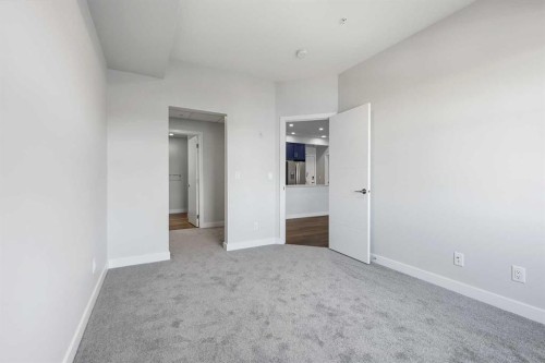 303-255 Les Jardins Park Se, Calgary, AB - Indoor Photo Showing Other Room