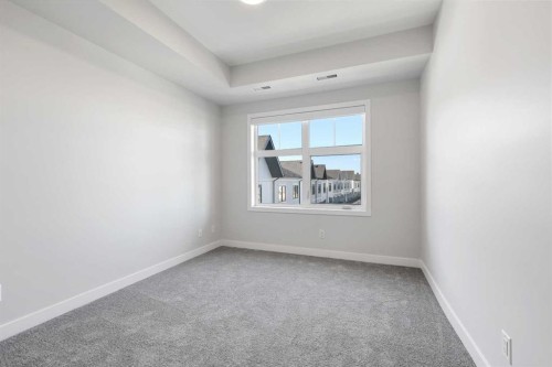 303-255 Les Jardins Park Se, Calgary, AB - Indoor Photo Showing Other Room