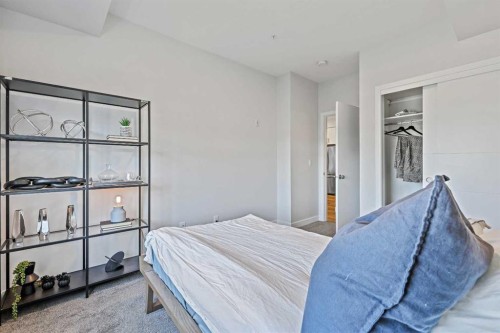 305-255 Les Jardins Park Se, Calgary, AB - Indoor Photo Showing Bedroom
