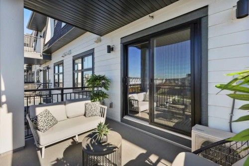 305-255 Les Jardins Park Se, Calgary, AB - Outdoor With Balcony With Exterior