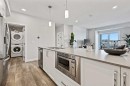 305-255 Les Jardins Park Se, Calgary, AB  - Indoor Photo Showing Kitchen With Double Sink 