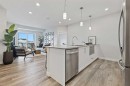 305-255 Les Jardins Park Se, Calgary, AB  - Indoor Photo Showing Kitchen With Stainless Steel Kitchen With Upgraded Kitchen 