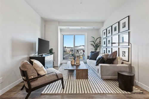 305-255 Les Jardins Park Se, Calgary, AB - Indoor Photo Showing Living Room