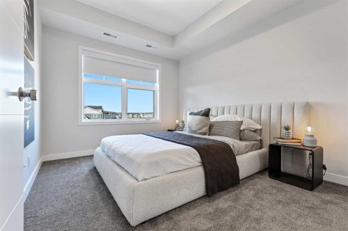 305-255 Les Jardins Park Se, Calgary, AB - Indoor Photo Showing Bedroom