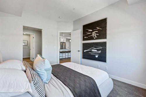 305-255 Les Jardins Park Se, Calgary, AB - Indoor Photo Showing Bedroom