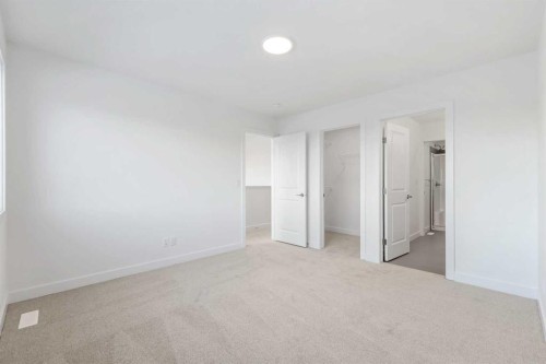 3 Legacy Glen Rise Se, Calgary, AB - Indoor Photo Showing Other Room