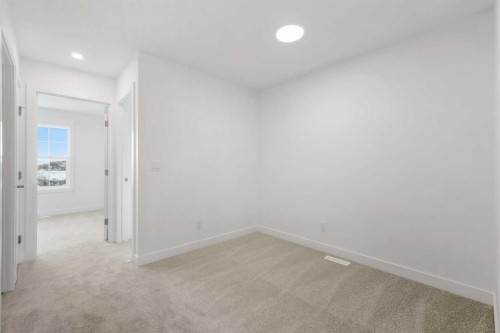 3 Legacy Glen Rise Se, Calgary, AB - Indoor Photo Showing Other Room