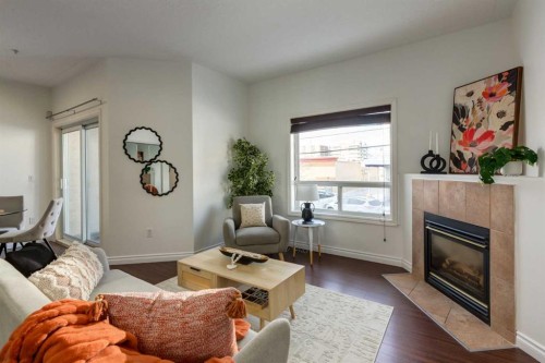 1106-1514 11 Street Sw, Calgary, AB - Indoor Photo Showing Living Room With Fireplace