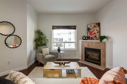 1106-1514 11 Street Sw, Calgary, AB - Indoor Photo Showing Living Room With Fireplace