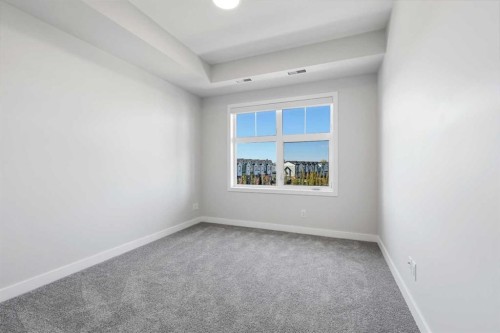 317-255 Les Jardins Park Se, Calgary, AB - Indoor Photo Showing Other Room