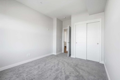 317-255 Les Jardins Park Se, Calgary, AB - Indoor Photo Showing Other Room