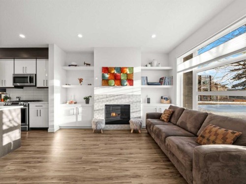 1883 47 Street Nw, Calgary, AB - Indoor Photo Showing Other Room With Fireplace