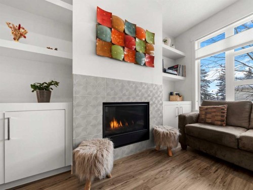 1883 47 Street Nw, Calgary, AB - Indoor Photo Showing Living Room With Fireplace