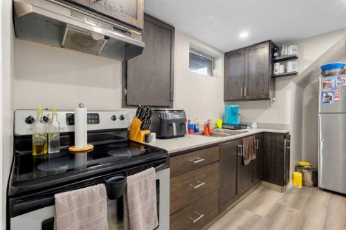 4612 Fortune Road Se, Calgary, AB - Indoor Photo Showing Kitchen With Double Sink