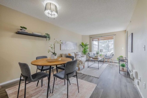 1311-950 Arbour Lake Road Nw, Calgary, AB - Indoor Photo Showing Dining Room