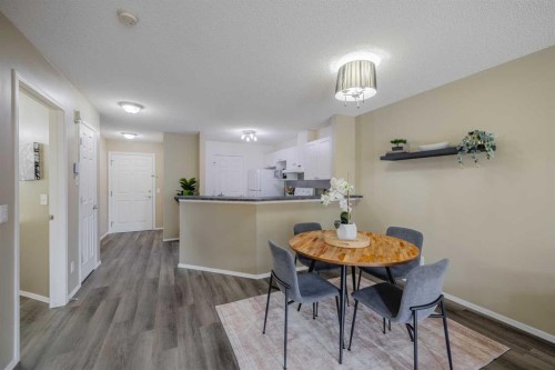 1311-950 Arbour Lake Road Nw, Calgary, AB - Indoor Photo Showing Dining Room