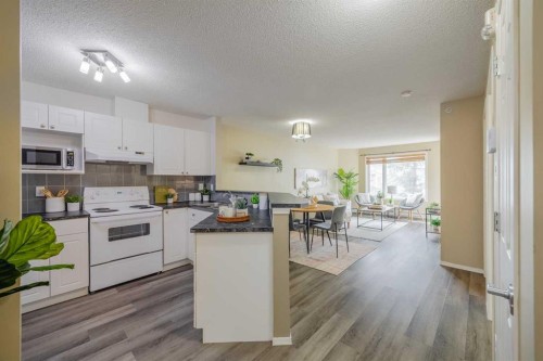 1311-950 Arbour Lake Road Nw, Calgary, AB - Indoor Photo Showing Kitchen
