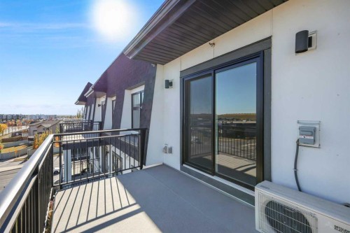 406-255 Les Jardins Park Se, Calgary, AB - Outdoor With Balcony With Exterior