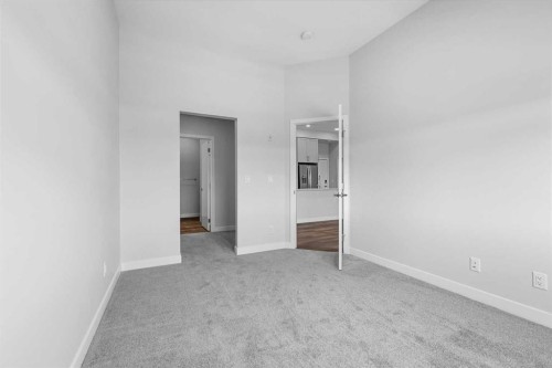406-255 Les Jardins Park Se, Calgary, AB - Indoor Photo Showing Other Room