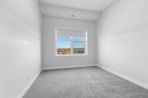 406-255 Les Jardins Park Se, Calgary, AB - Indoor Photo Showing Other Room