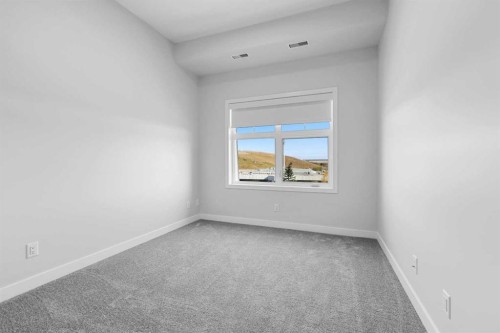 408-255 Les Jardins Park Se, Calgary, AB - Indoor Photo Showing Other Room