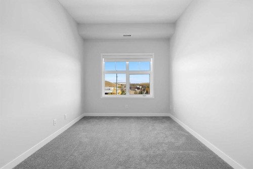 408-255 Les Jardins Park Se, Calgary, AB - Indoor Photo Showing Other Room