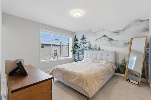 208-562 Seton Circle Se, Calgary, AB - Indoor Photo Showing Bedroom