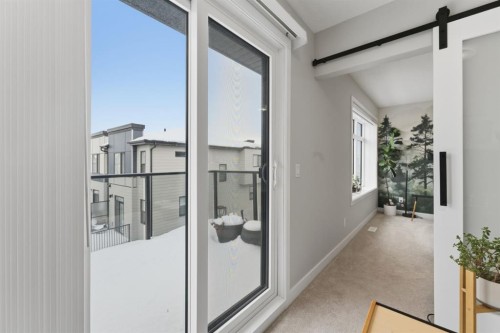 208-562 Seton Circle Se, Calgary, AB - Indoor Photo Showing Other Room