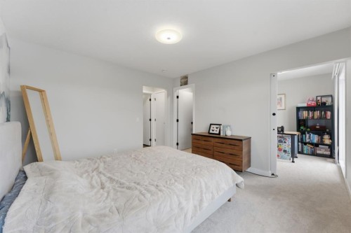 208-562 Seton Circle Se, Calgary, AB - Indoor Photo Showing Bedroom